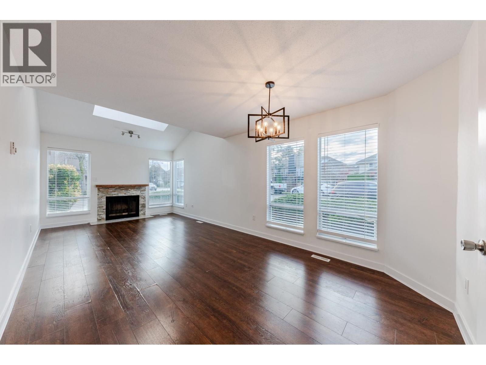 8008 Ash Street, Richmond, BC - Indoor Photo Showing Living Room With Fireplace