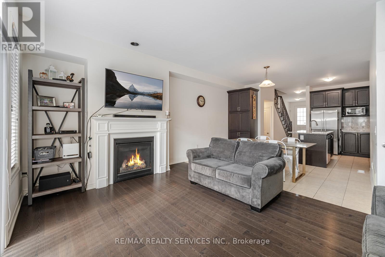 34 Pennycross Crescent, Brampton, ON - Indoor Photo Showing Living Room With Fireplace