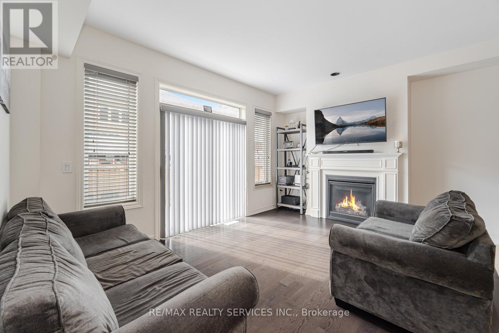 34 Pennycross Crescent, Brampton, ON - Indoor Photo Showing Living Room With Fireplace
