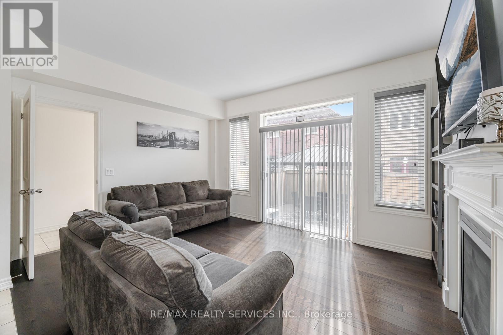 34 Pennycross Crescent, Brampton, ON - Indoor Photo Showing Living Room With Fireplace