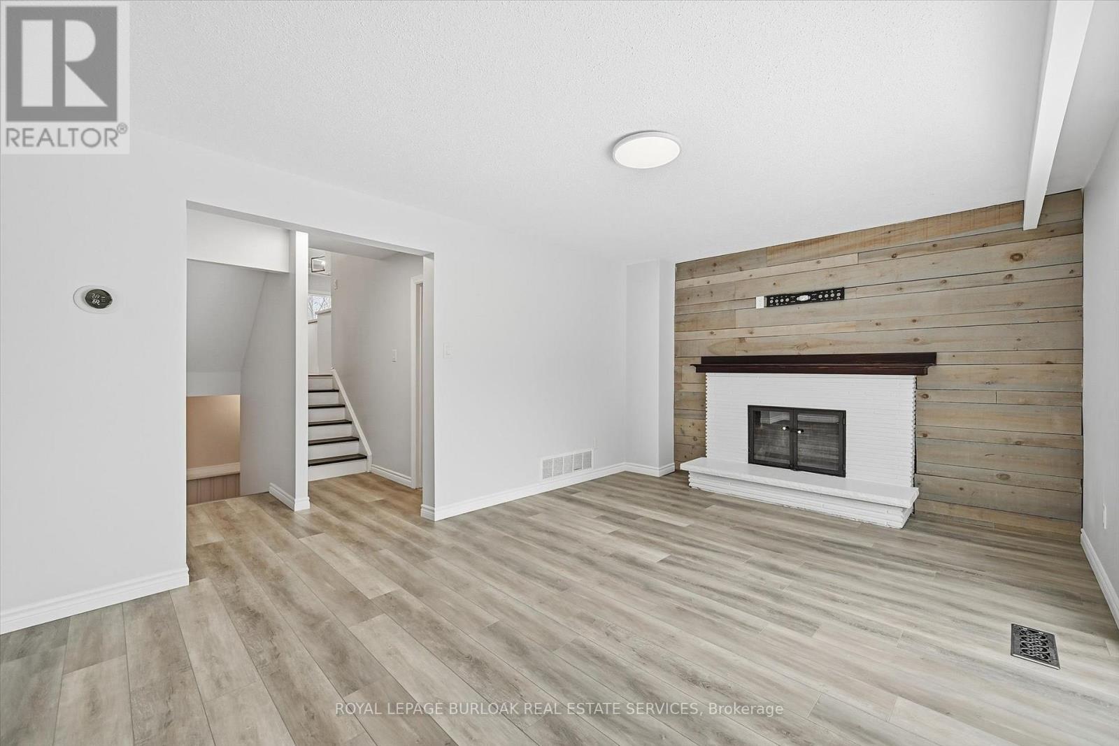 2344 Glastonbury Road, Burlington, ON - Indoor Photo Showing Other Room With Fireplace