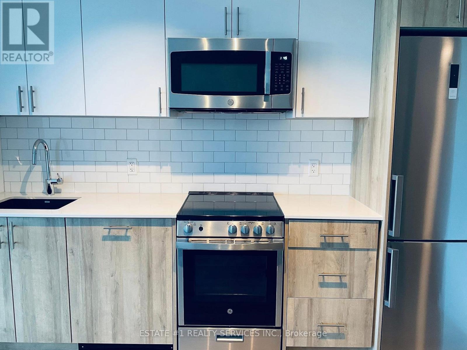 703 - 1195 The Queensway, Toronto, ON - Indoor Photo Showing Kitchen With Stainless Steel Kitchen With Upgraded Kitchen