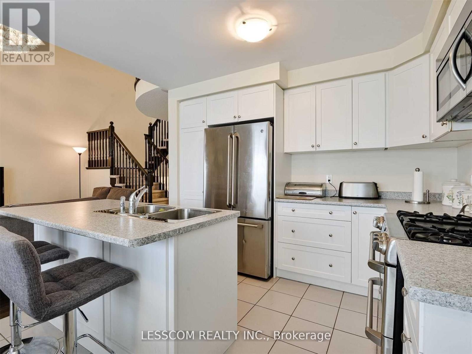 38 - 57 Muzzo Drive, Brampton, ON - Indoor Photo Showing Kitchen With Stainless Steel Kitchen With Double Sink