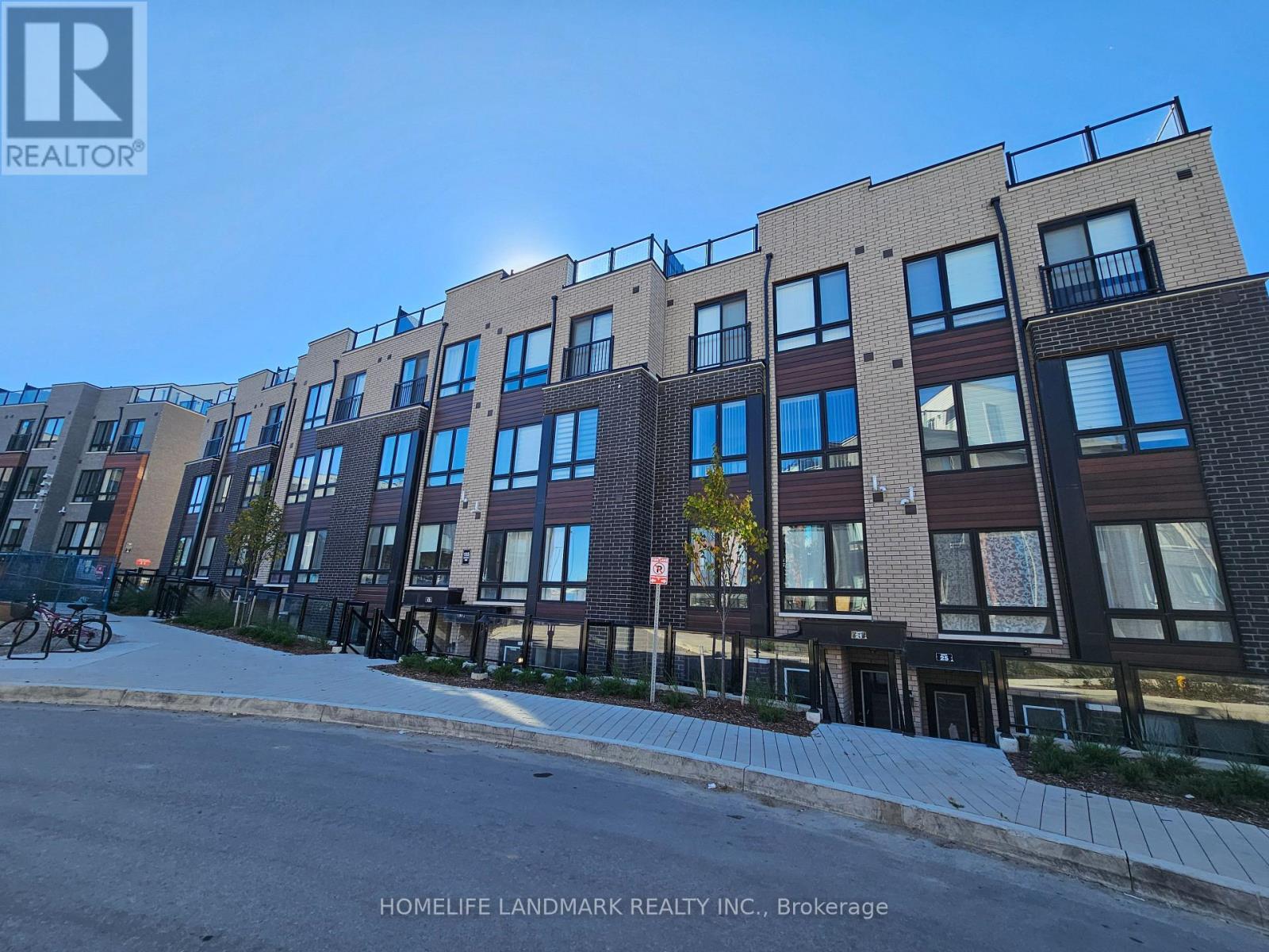 #5 - 155 Tapscott Road, Toronto, ON - Outdoor With Facade