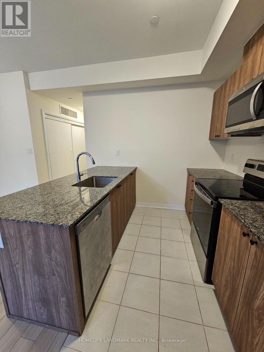 #5 - 155 Tapscott Road, Toronto, ON - Indoor Photo Showing Kitchen