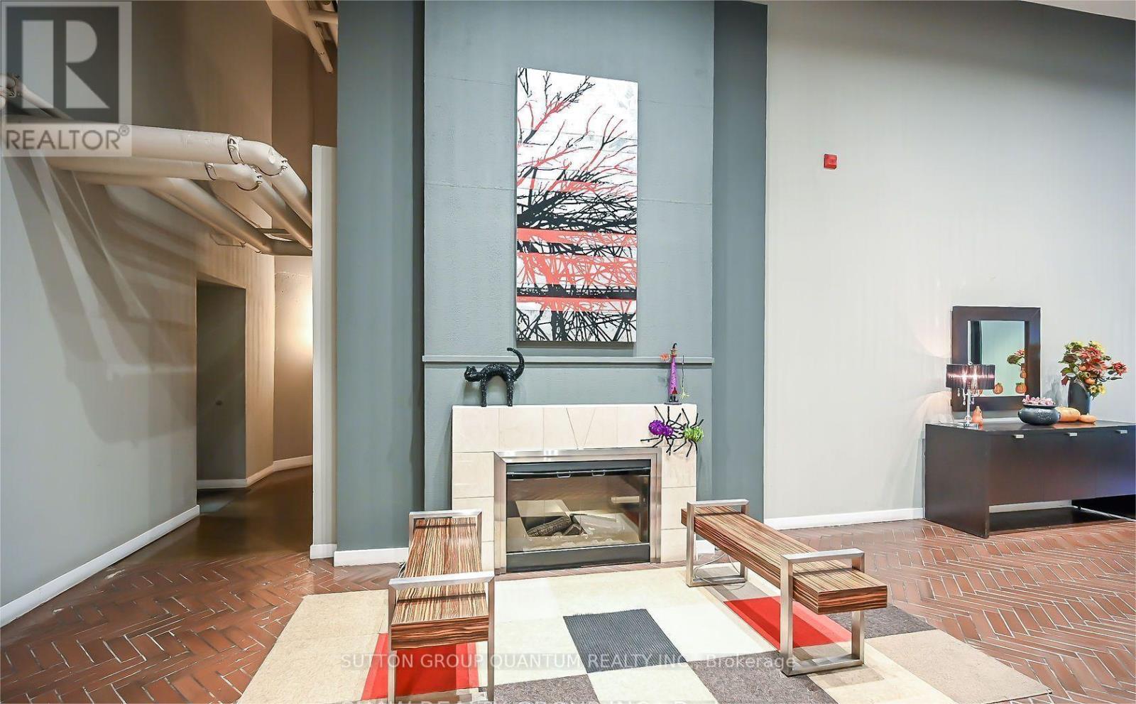 307 - 66 Bay Street S, Hamilton, ON - Indoor With Fireplace