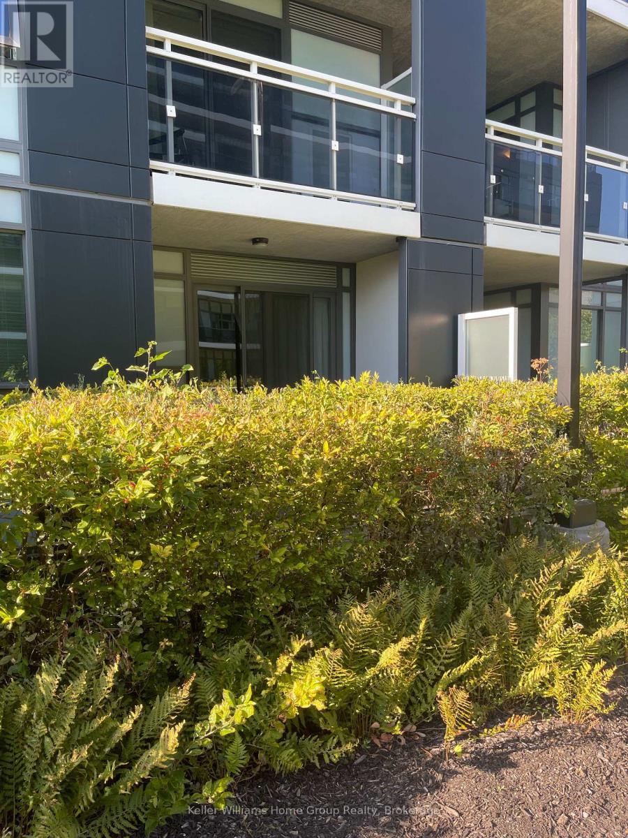 Looking out to the grounds - 205 - 63 Arthur Street S, Guelph (St. Patrick'S Ward), ON - Outdoor With Balcony