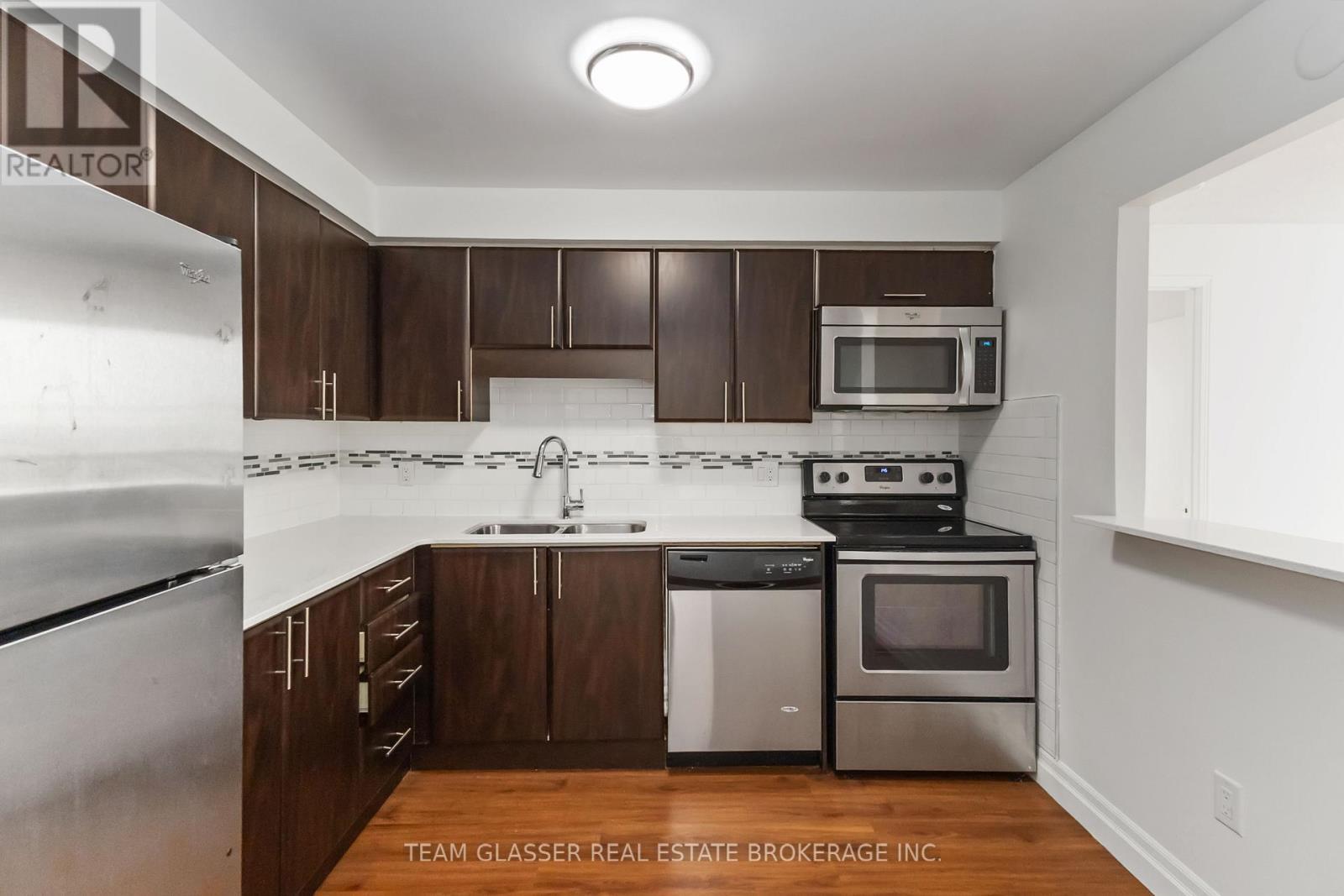 1202 - 675 Richmond Street, London East (East F), ON - Indoor Photo Showing Kitchen With Stainless Steel Kitchen With Double Sink