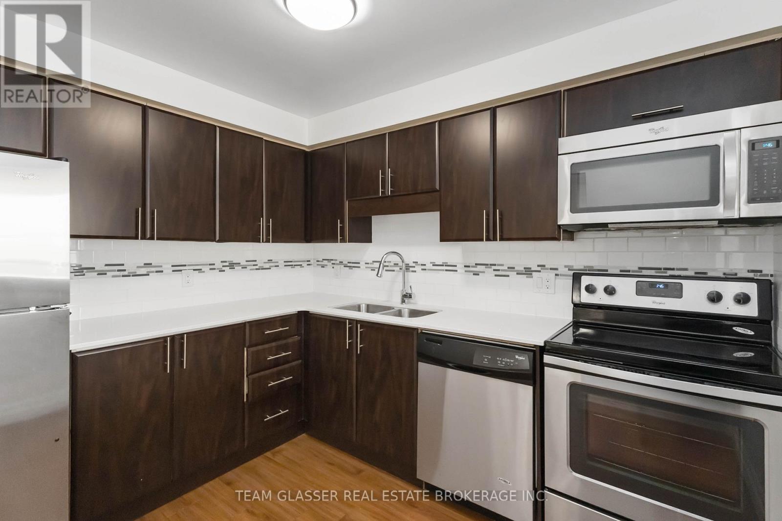 1202 - 675 Richmond Street, London East (East F), ON - Indoor Photo Showing Kitchen With Stainless Steel Kitchen With Double Sink