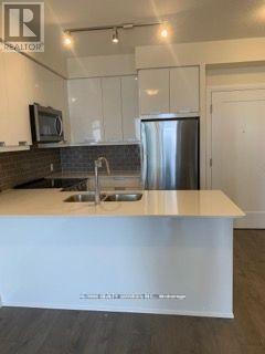 2219 - 35 Watergarden Drive, Mississauga, ON - Indoor Photo Showing Kitchen With Double Sink