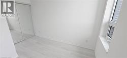 Unfurnished bedroom with a closet and light hardwood / wood-style flooring -