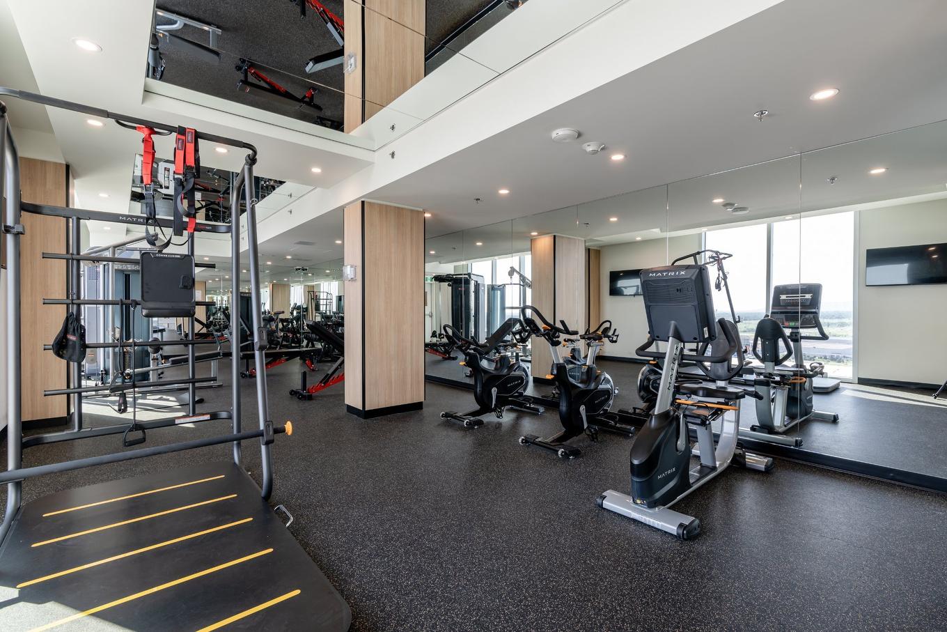 Salle d'exercice - 1612-60 Rue De L'Éclipse, Brossard, QC - Indoor Photo Showing Gym Room