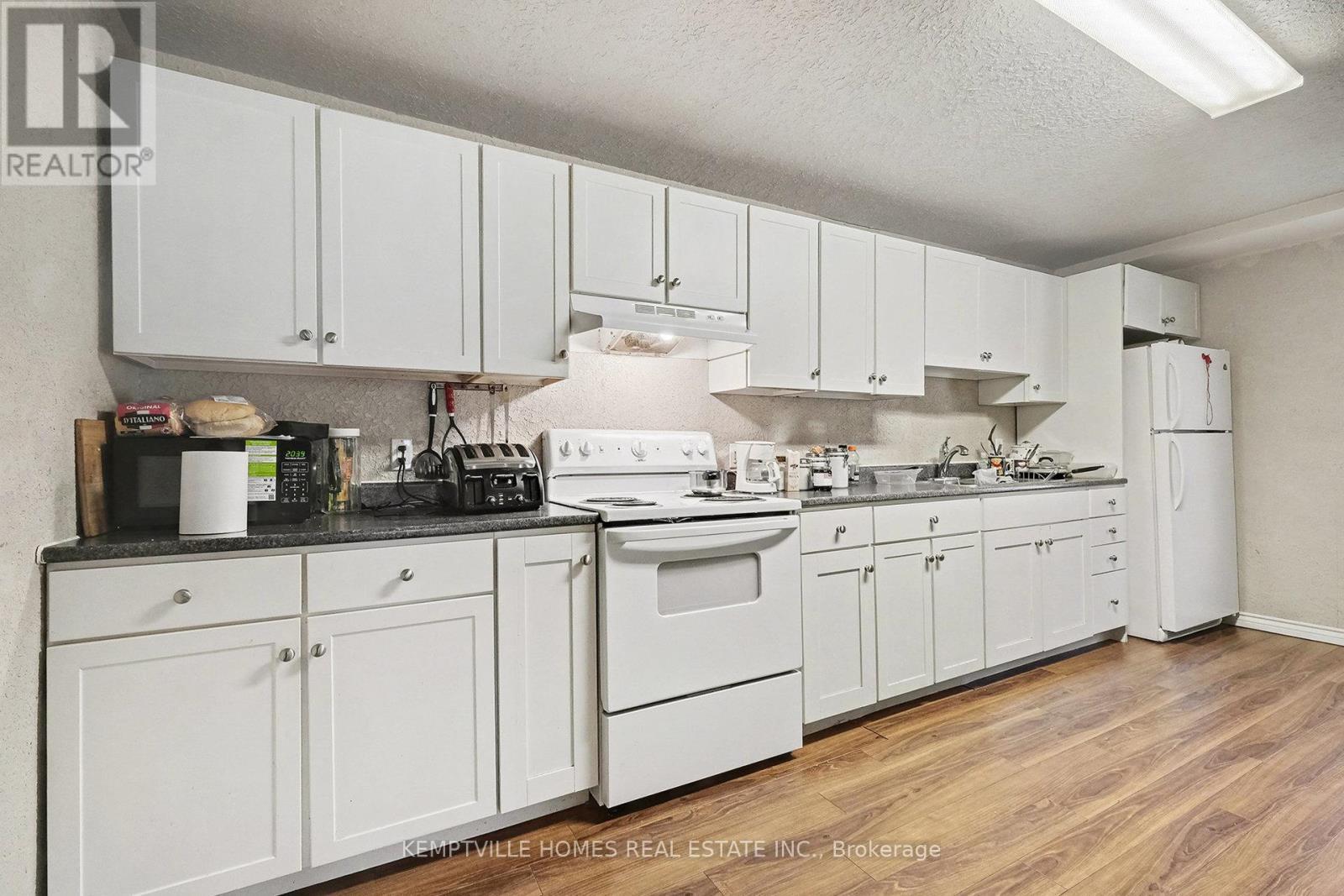 UNIT 1 - 803 St Lawrence Street, Prescott, ON - Indoor Photo Showing Kitchen With Double Sink