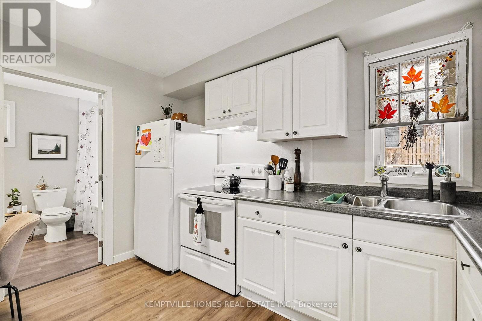 UNIT 3 - LITTLE BUNGALOW (1 BED/1BATH) - 803 St Lawrence Street, Prescott, ON - Indoor Photo Showing Kitchen With Double Sink