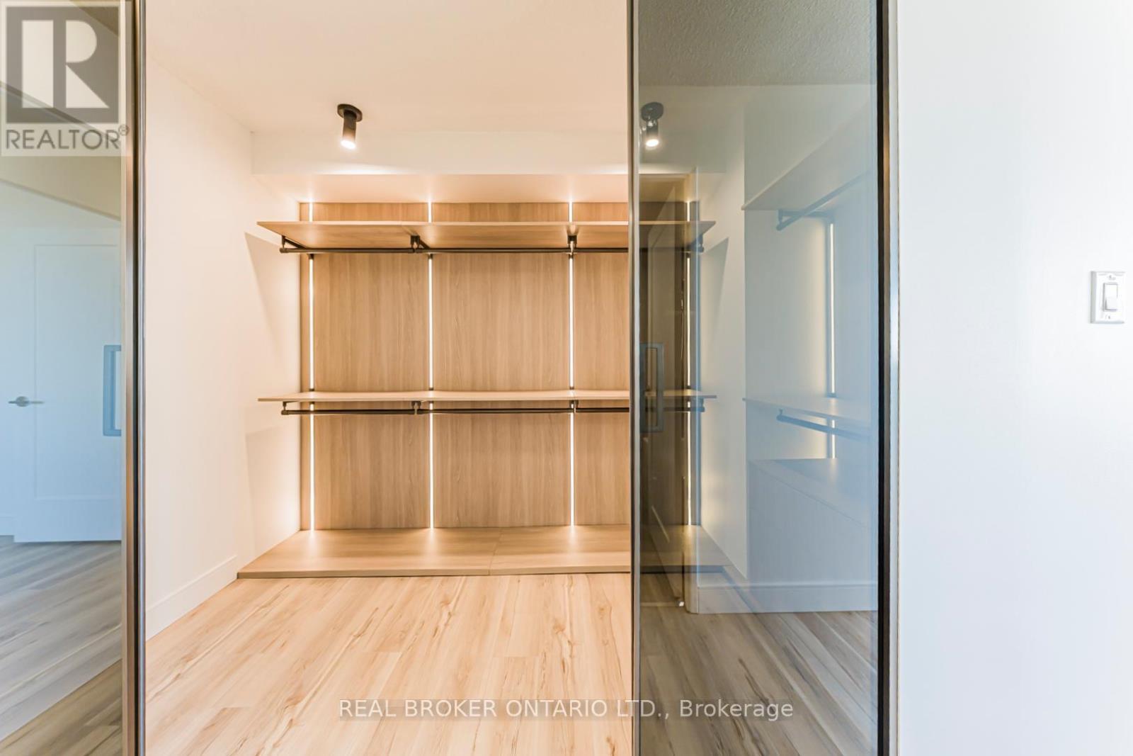 Primary Bedroom Walk-in Closet - 1503 - 3131 Bridletowne Circle, Toronto, ON - Indoor