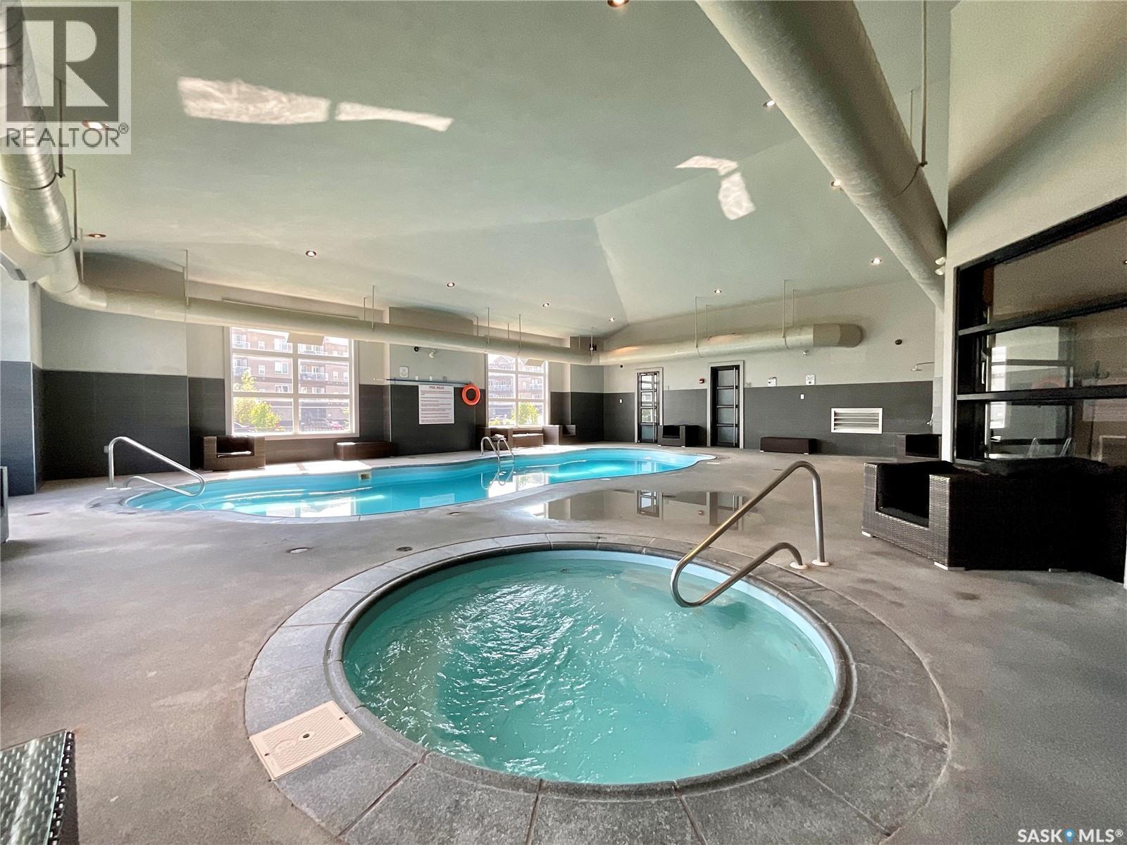 312 1510 Neville Drive, Regina, SK - Indoor Photo Showing Other Room With In Ground Pool