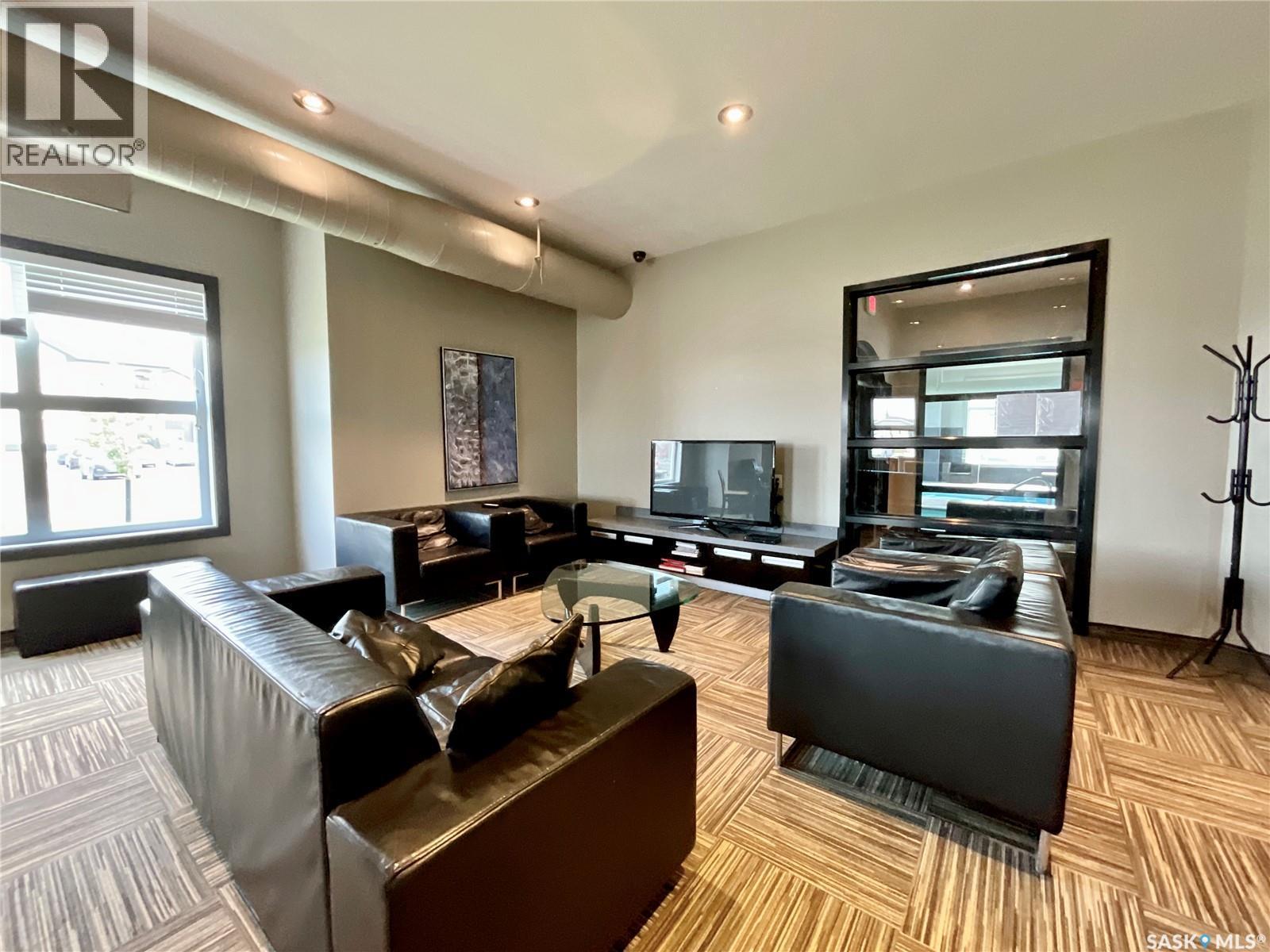 312 1510 Neville Drive, Regina, SK - Indoor Photo Showing Living Room