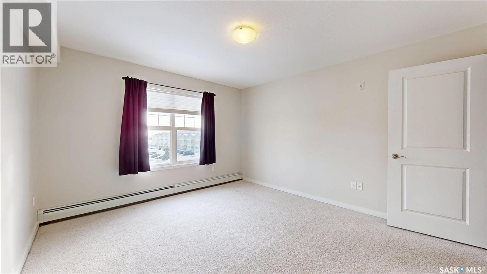312 1510 Neville Drive, Regina, SK - Indoor Photo Showing Other Room
