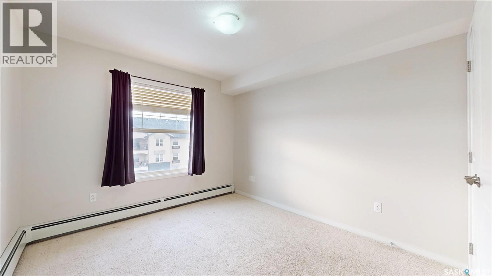 312 1510 Neville Drive, Regina, SK - Indoor Photo Showing Other Room