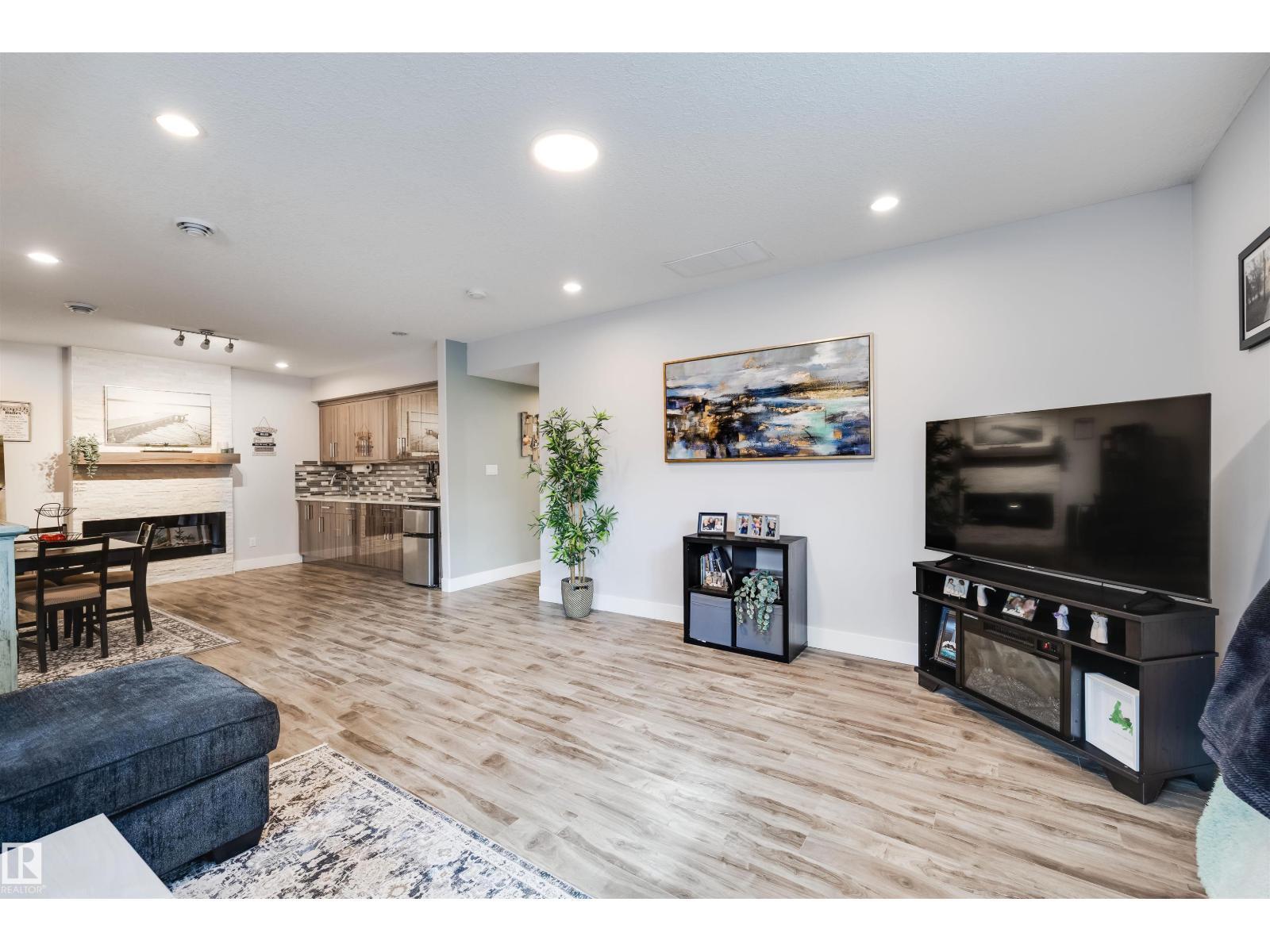 3901 44 Av, Beaumont, AB - Indoor Photo Showing Living Room With Fireplace