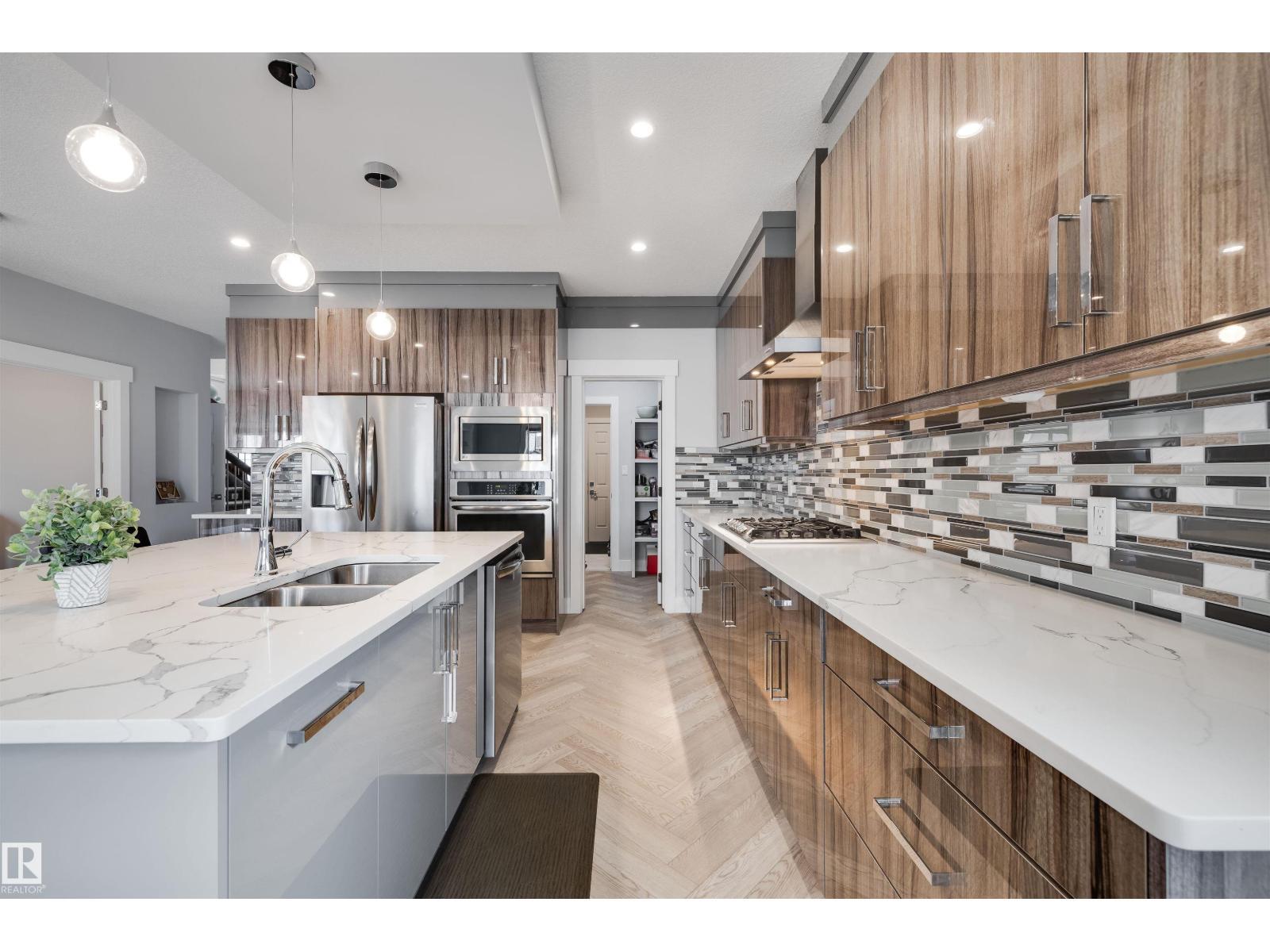 3901 44 Av, Beaumont, AB - Indoor Photo Showing Kitchen With Double Sink With Upgraded Kitchen