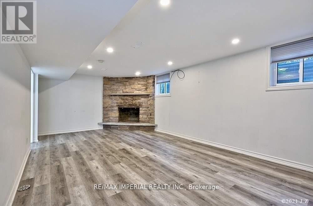 Lower - 711 Gilbert Street W, Whitby, ON - Indoor With Fireplace