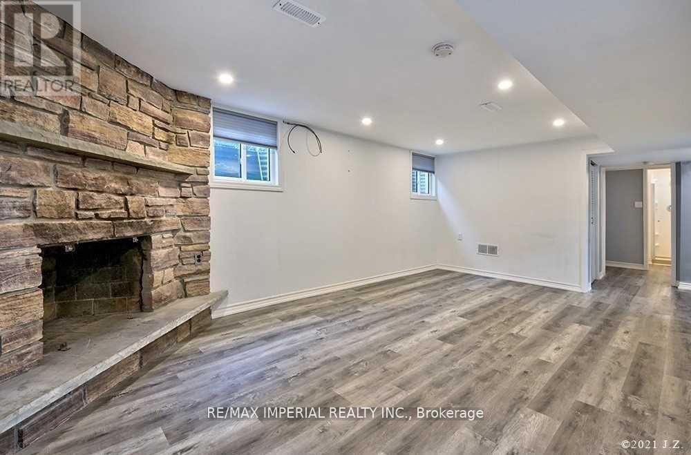 Lower - 711 Gilbert Street W, Whitby, ON - Indoor With Fireplace