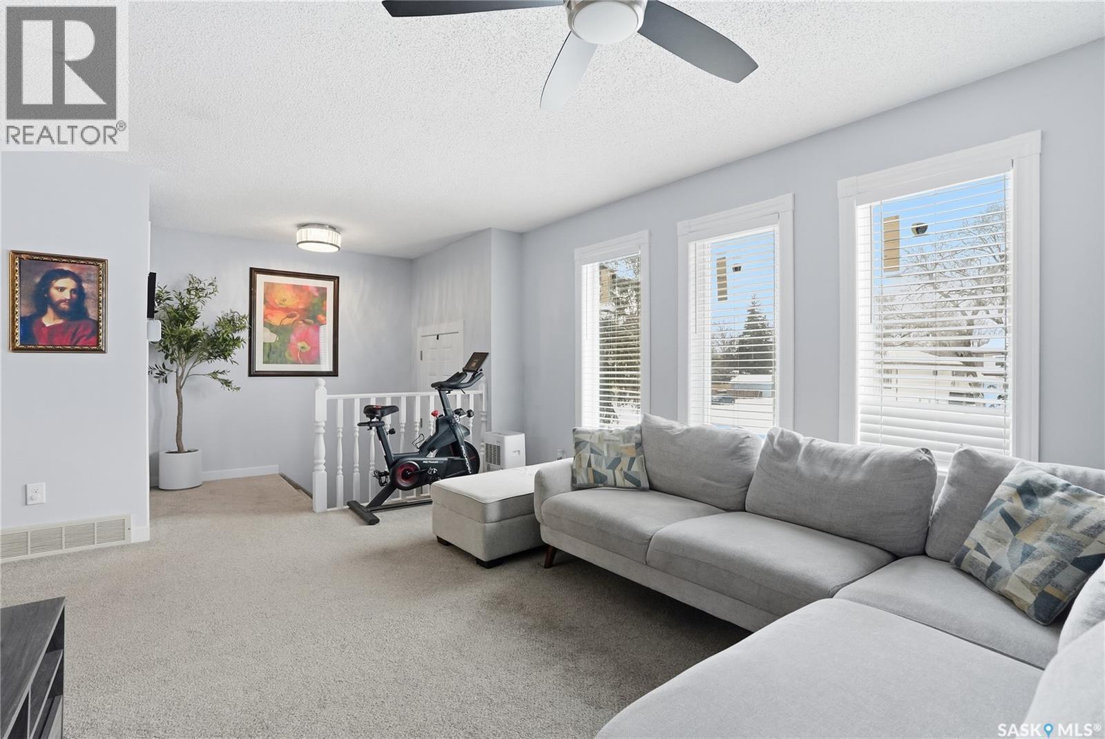 203A Dunlop Street, Saskatoon, SK - Indoor Photo Showing Living Room