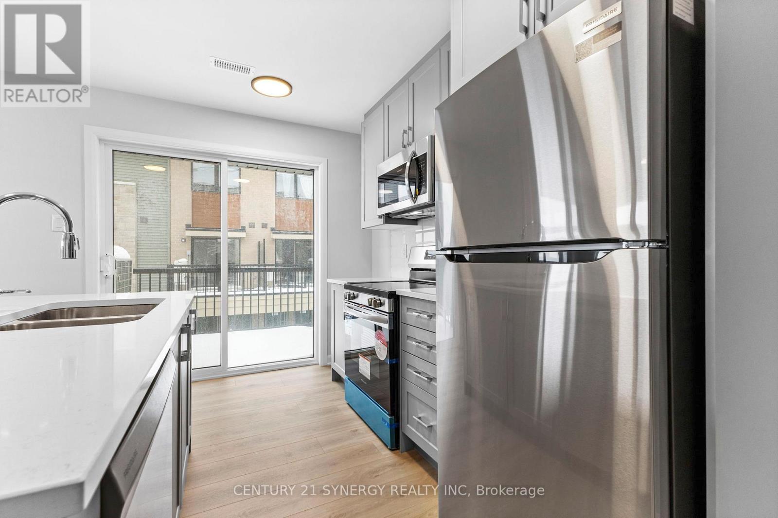 11 - 801 Glenroy Gilbert Drive, Ottawa, ON - Indoor Photo Showing Kitchen With Double Sink