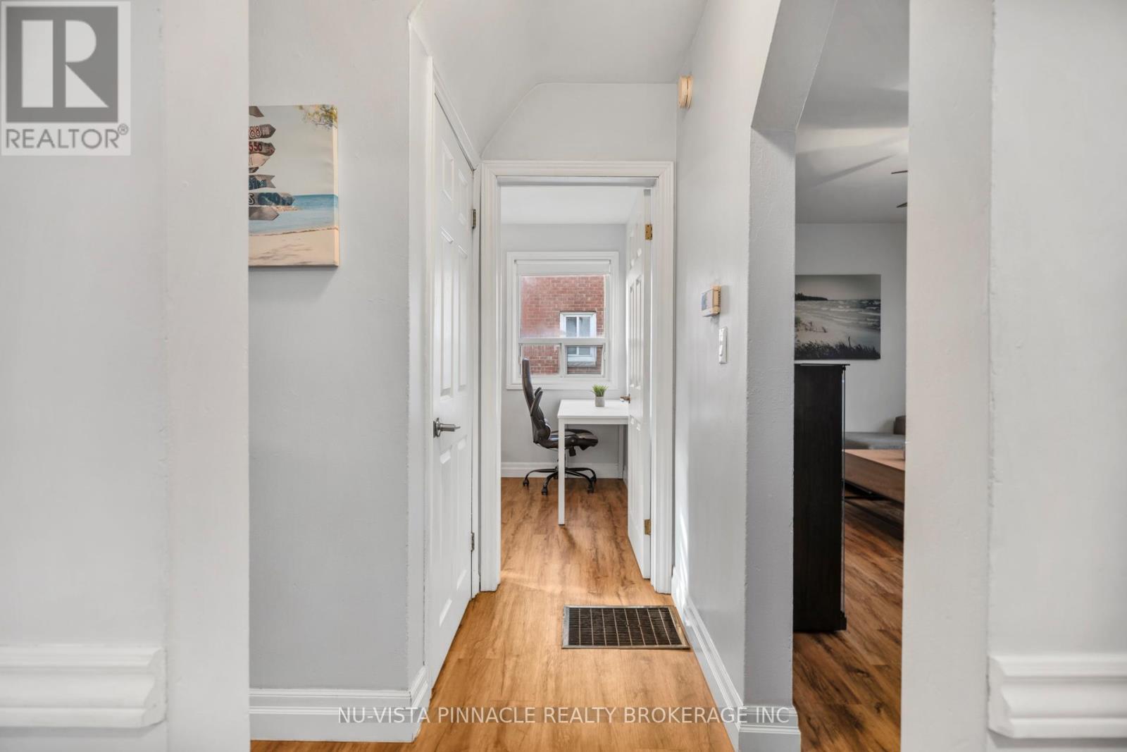 All laminate on main floor, updated light fixtures - 81 Dunkirk Drive N, St. Thomas, ON - Indoor Photo Showing Other Room