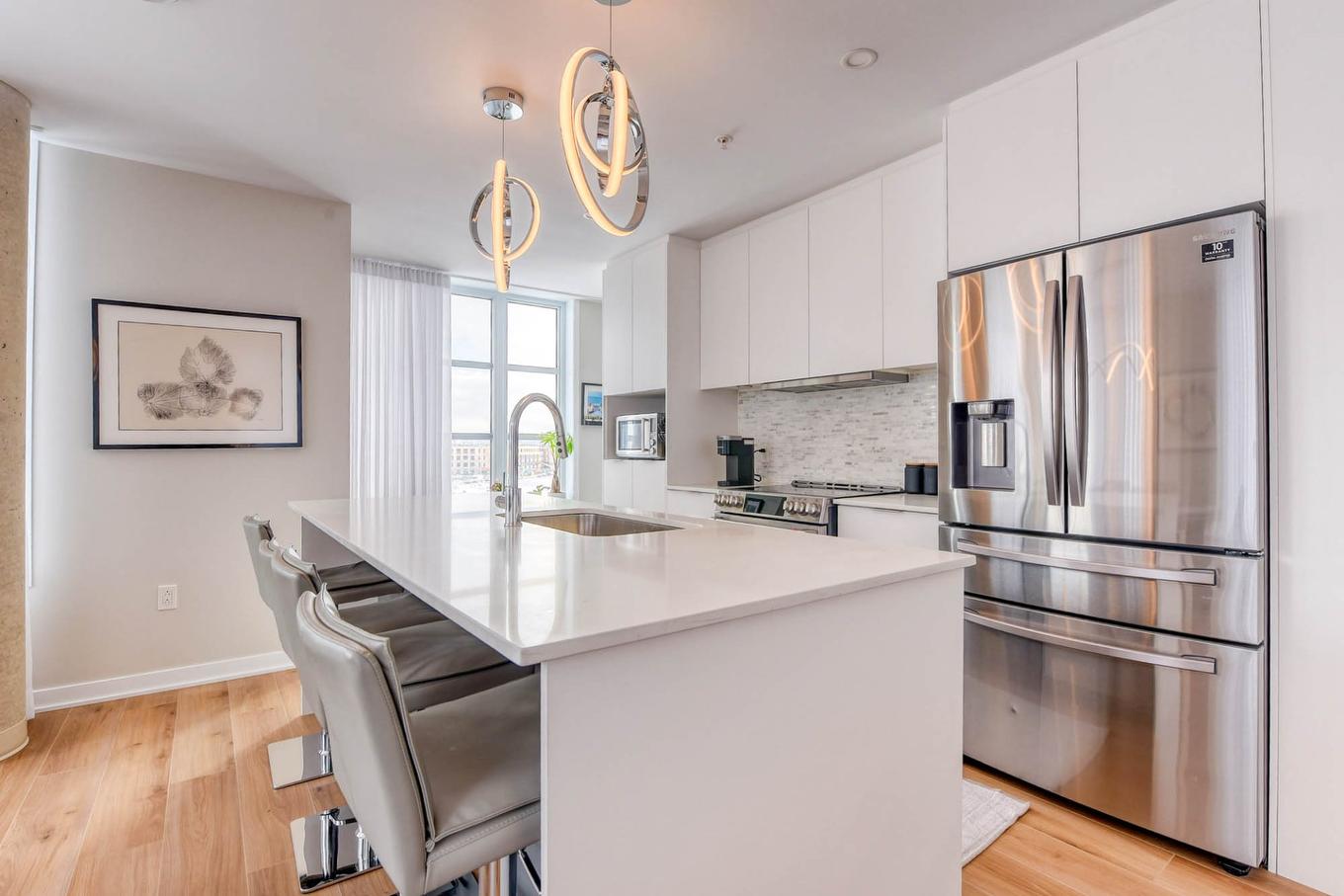 Cuisine - 401-2335 Rue Des Équinoxes, Montréal (Saint-Laurent), QC - Indoor Photo Showing Kitchen With Upgraded Kitchen