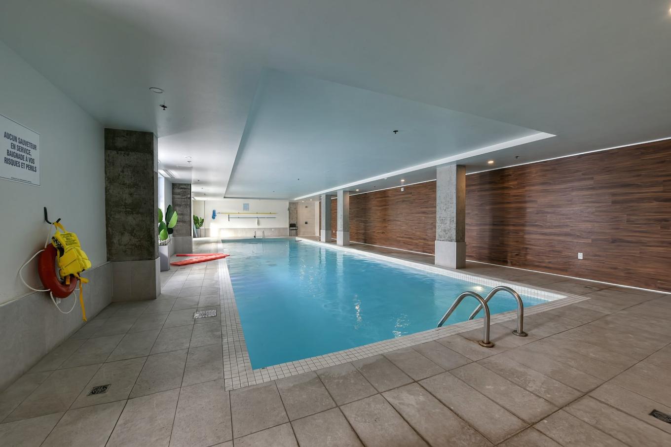 Piscine - 401-2335 Rue Des Équinoxes, Montréal (Saint-Laurent), QC - Indoor Photo Showing Other Room With In Ground Pool