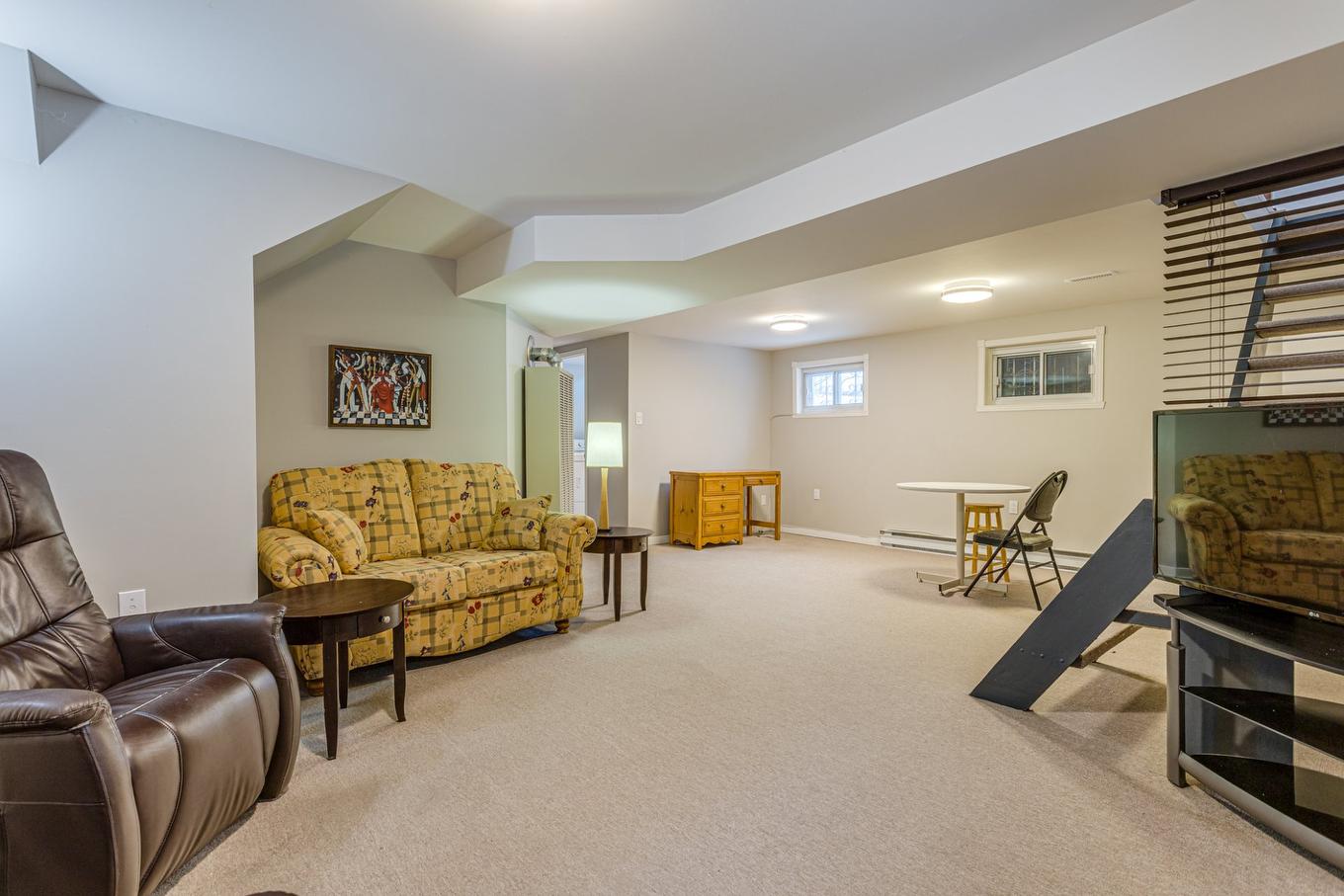 Salle familiale - 7680 Place Turpin, Brossard, QC - Indoor Photo Showing Basement