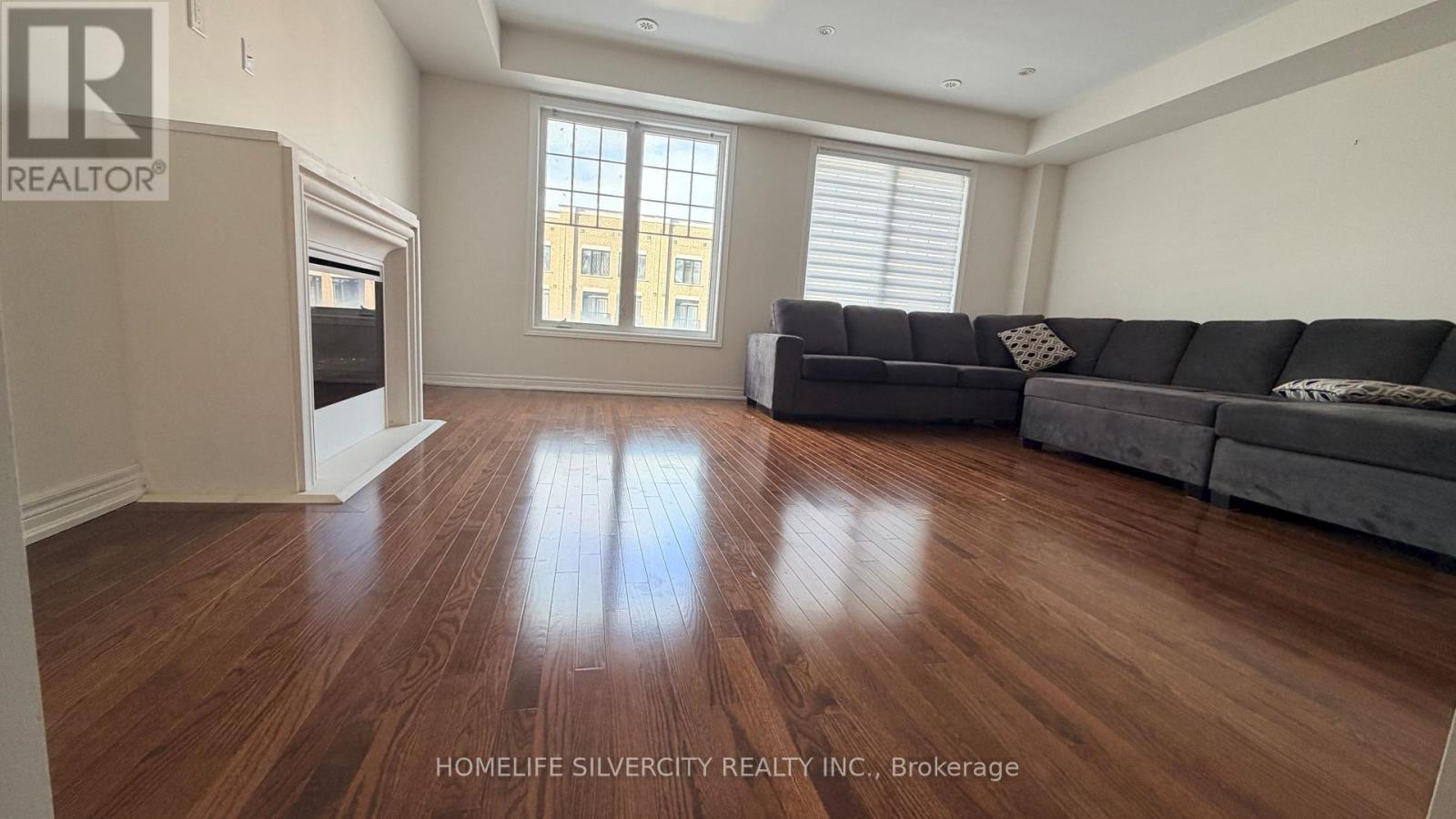 115 Inspire Boulevard, Brampton, ON - Indoor Photo Showing Living Room With Fireplace