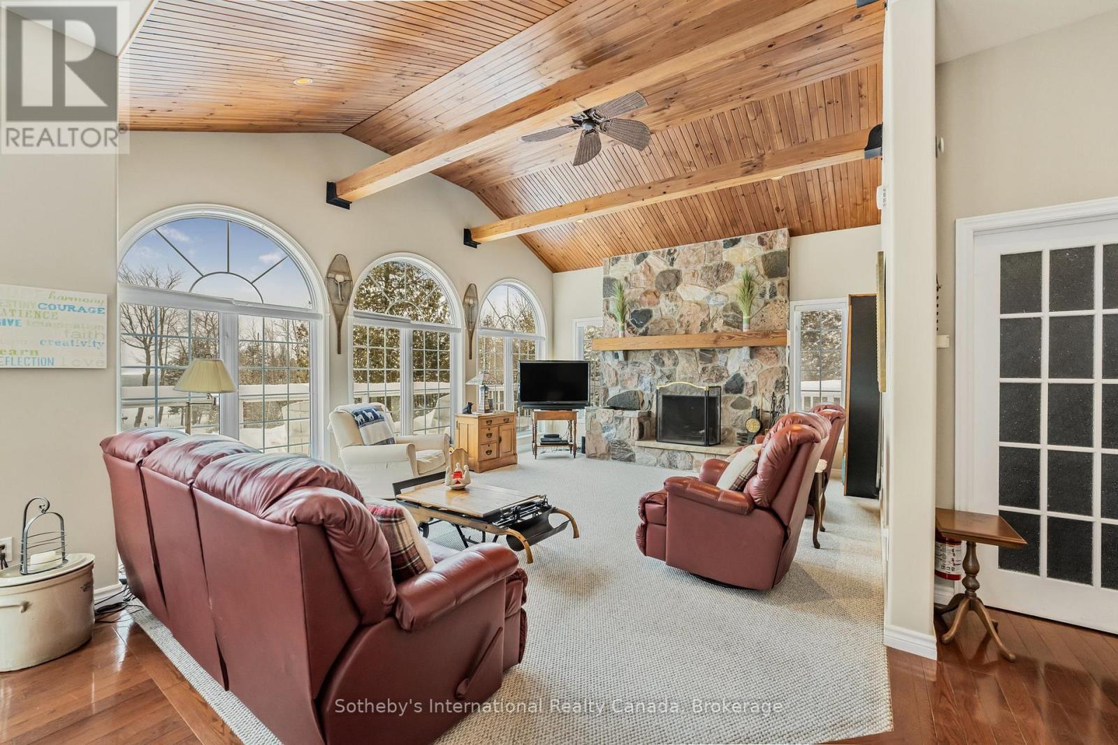 679 Sandy Bay Road, Tiny, ON - Indoor With Fireplace