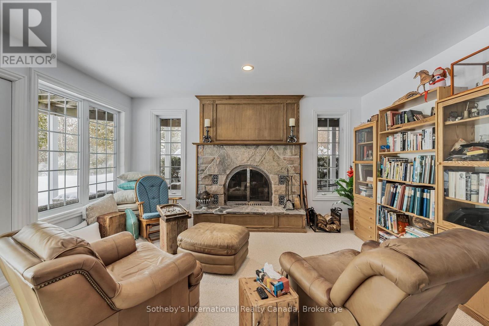 679 Sandy Bay Road, Tiny, ON - Indoor Photo Showing Living Room With Fireplace