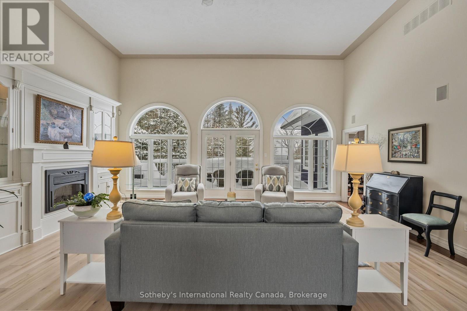 679 Sandy Bay Road, Tiny, ON - Indoor With Fireplace