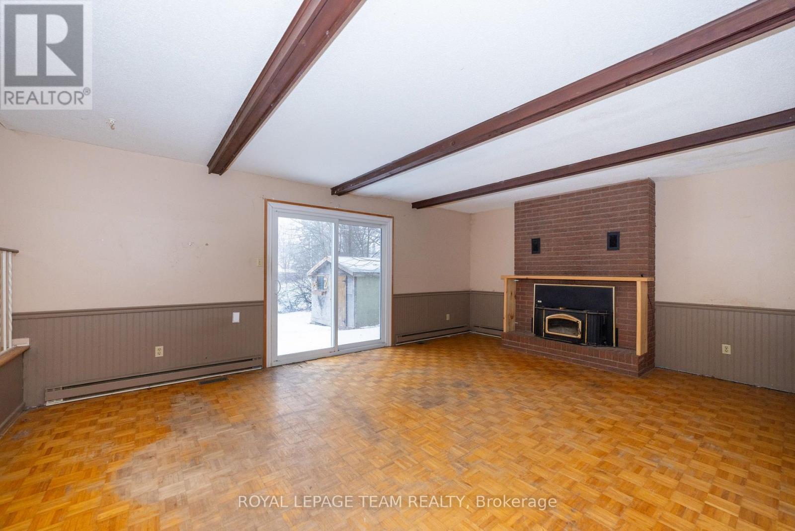 7 Coolbrook Cr Crescent, Ottawa, ON - Indoor Photo Showing Other Room With Fireplace