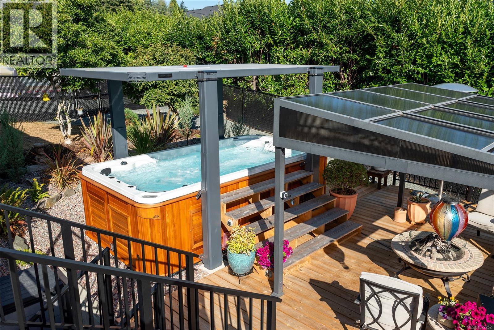 Lower level patio deck with (negotiable) swim spa. - 10091 View St, Chemainus, BC - Outdoor