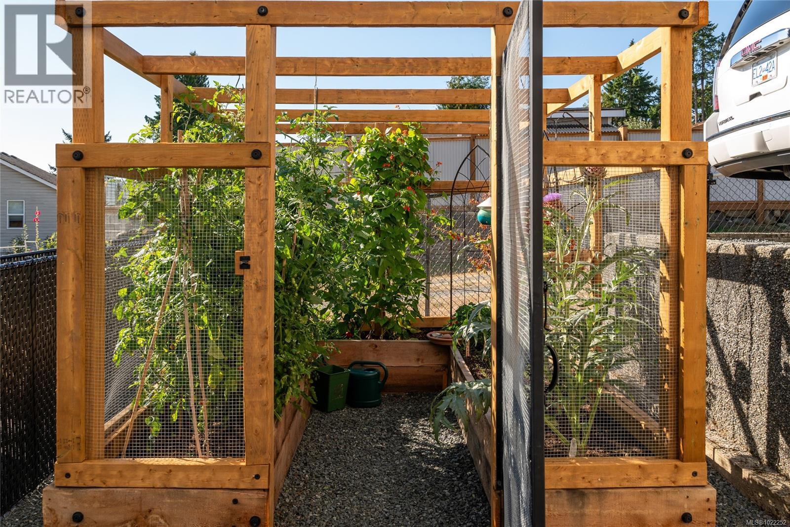 Protect those veggies from furry friends. - 10091 View St, Chemainus, BC - With Exterior