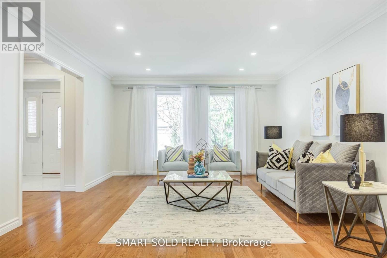 Upper Level - 45 Abbeywood Trail, Toronto, ON - Indoor Photo Showing Living Room
