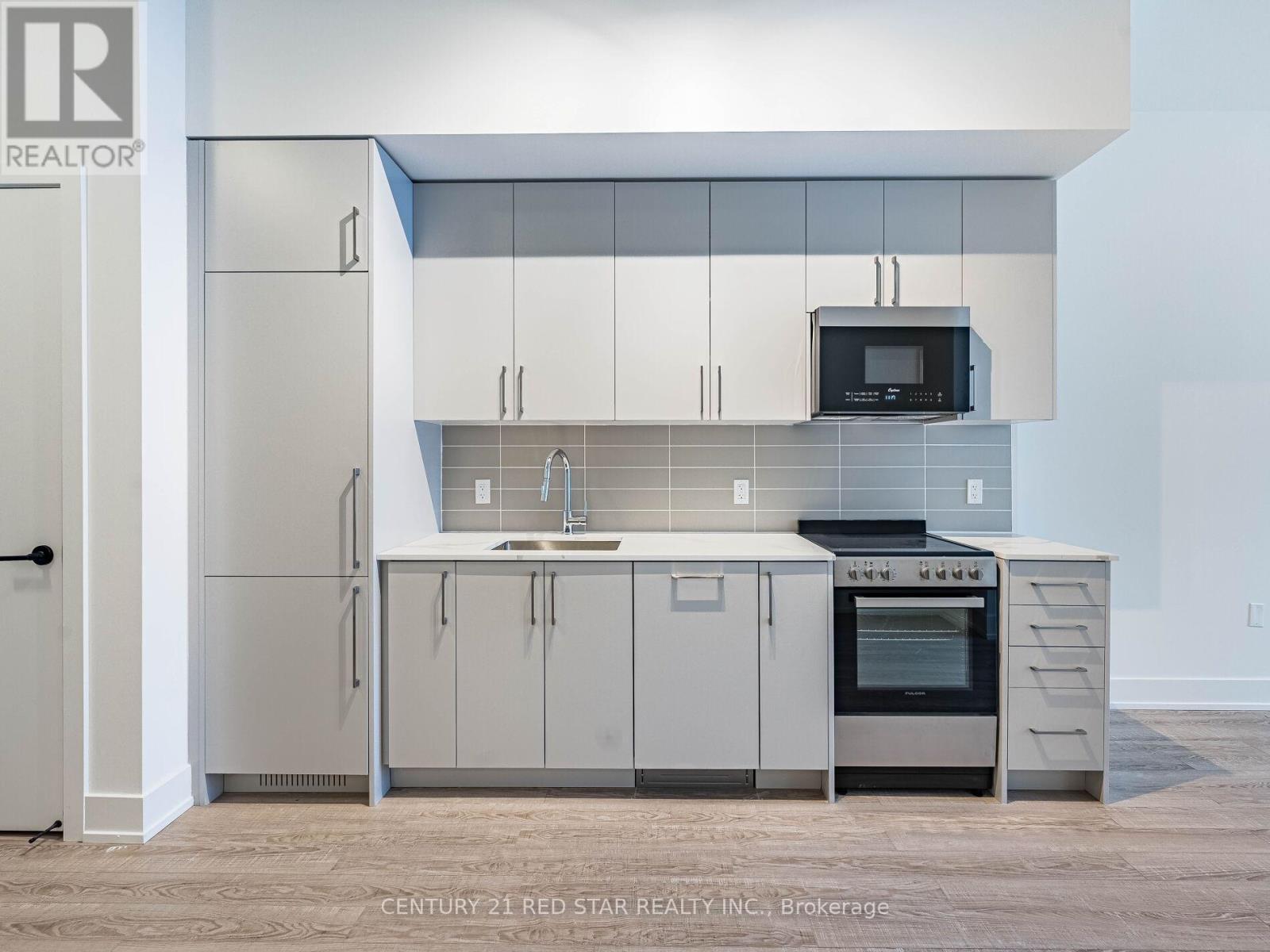 119 - 2075 King Road, King, ON - Indoor Photo Showing Kitchen