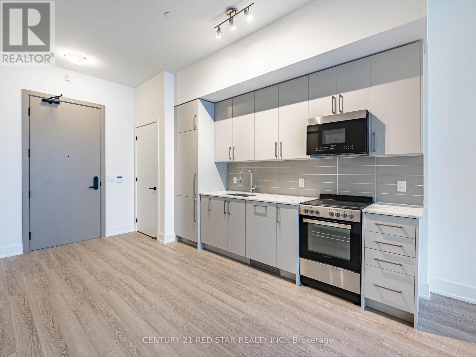119 - 2075 King Road, King, ON - Indoor Photo Showing Kitchen