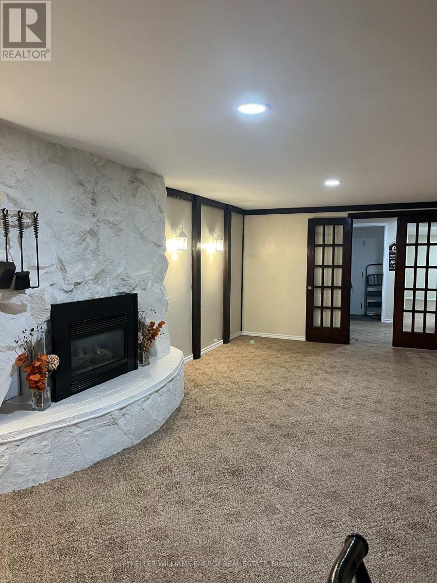 592 Radisson Avenue, Oshawa (Vanier), ON - Indoor Photo Showing Living Room With Fireplace