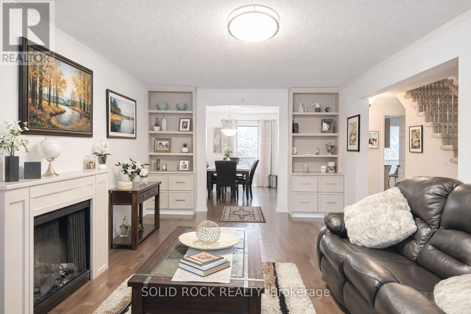 1 Bennett Street, Ottawa, ON - Indoor Photo Showing Living Room With Fireplace