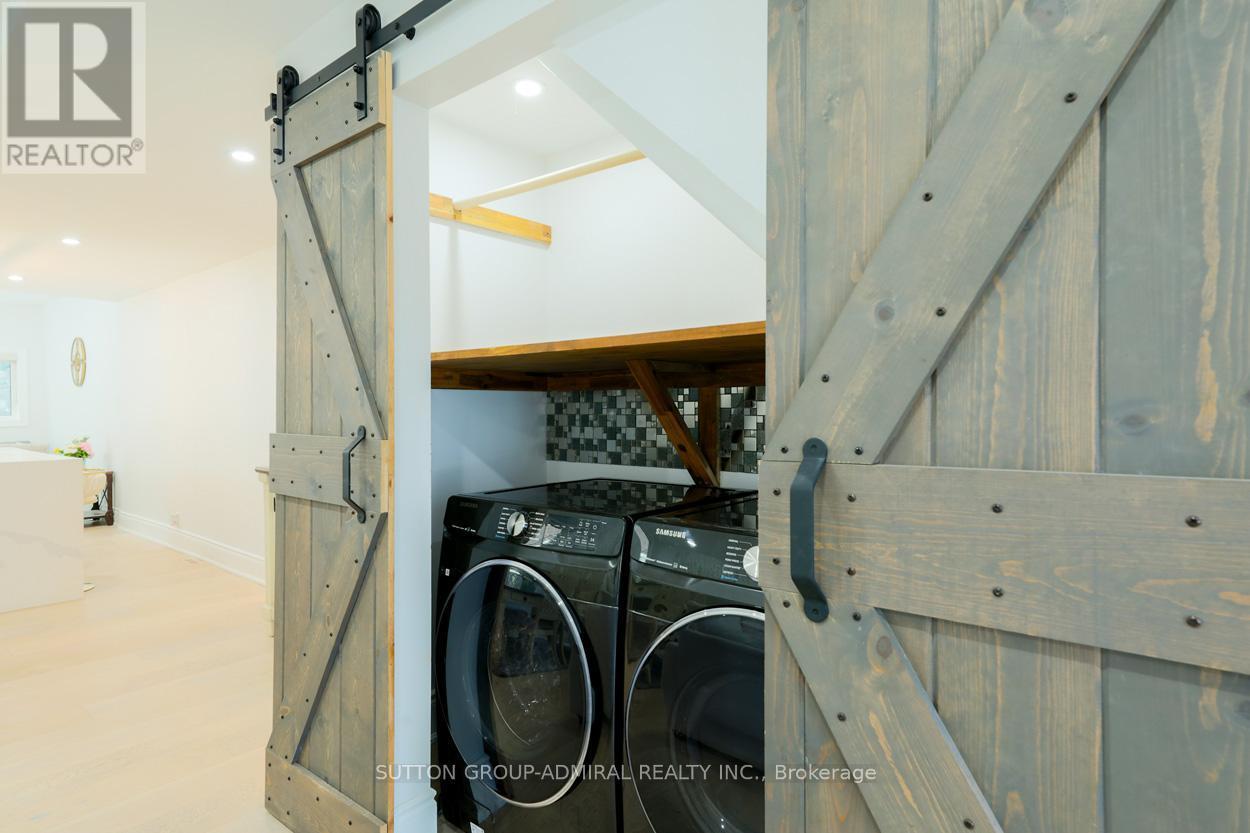 Main & 2Nd - 70 Carlaw Avenue, Toronto, ON - Indoor Photo Showing Laundry Room