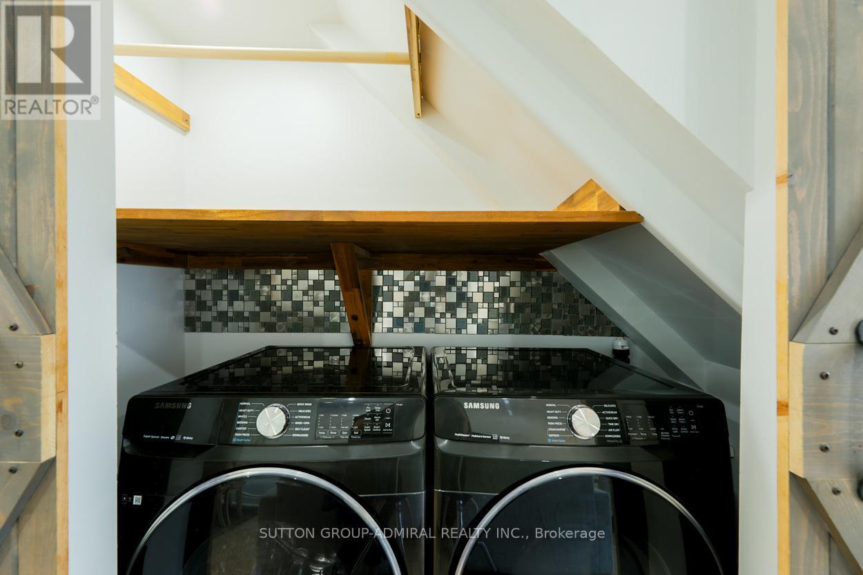 Main & 2Nd - 70 Carlaw Avenue, Toronto, ON - Indoor Photo Showing Laundry Room