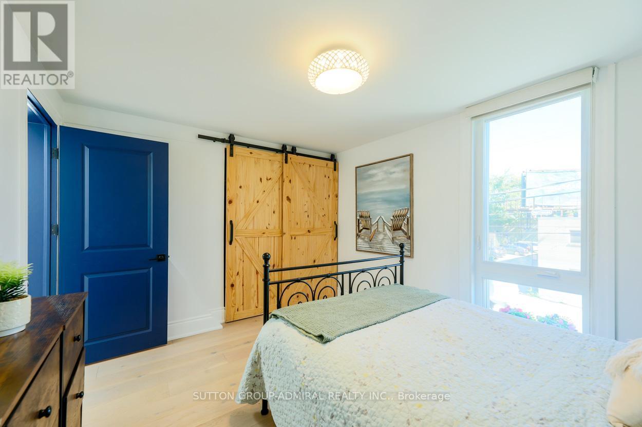 Main & 2Nd - 70 Carlaw Avenue, Toronto, ON - Indoor Photo Showing Bedroom