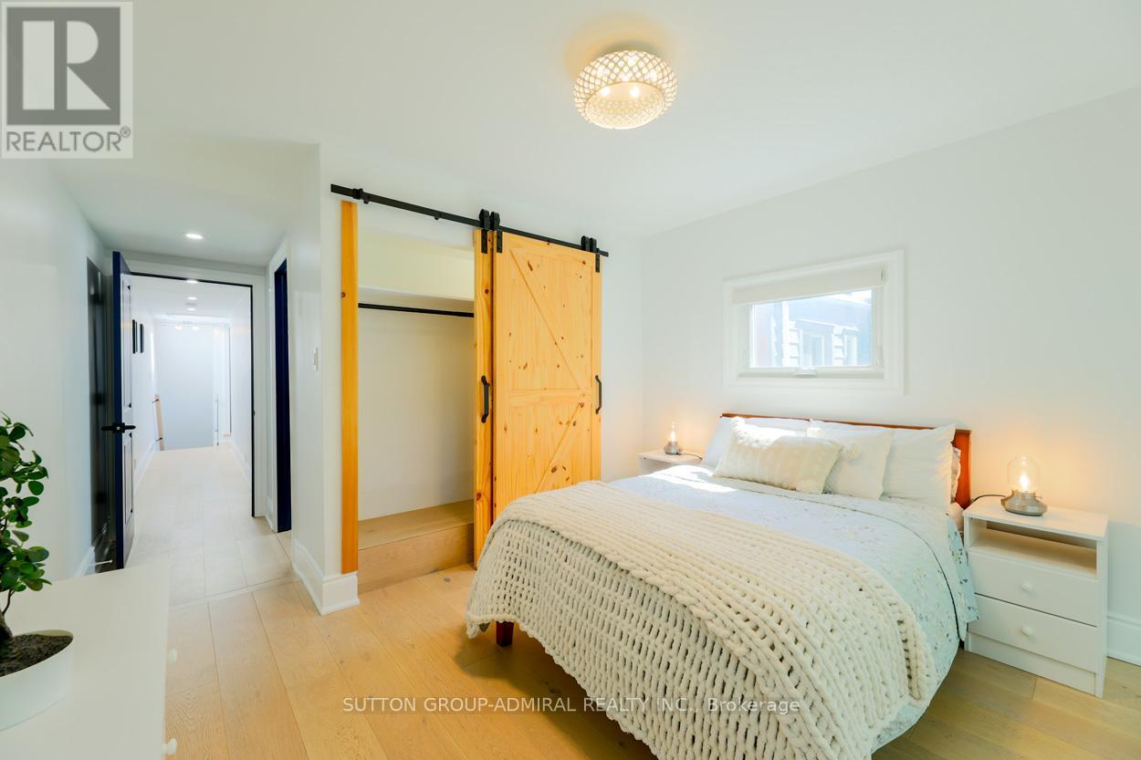 Main & 2Nd - 70 Carlaw Avenue, Toronto, ON - Indoor Photo Showing Bedroom