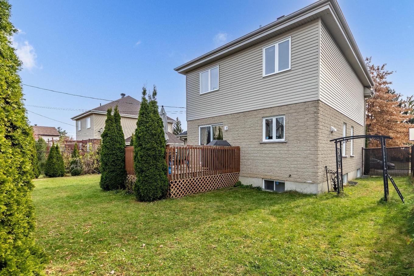 Back facade - 4946 Rue Évariste-Chaurette, Montréal (Pierrefonds-Roxboro), QC - Outdoor With Deck Patio Veranda With Exterior